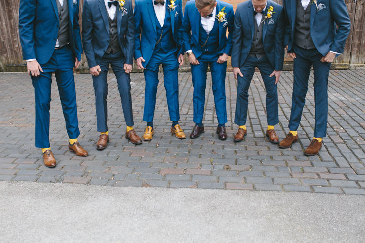 Groom Groomsmen Best Man Blue Suits Bow Ties Waistcoats Tan Shoes Socks Pretty Spring Yellow Fun Personal Wedding Yeldersley Hall Derbyshire http://www.elliegracephotography.co.uk/