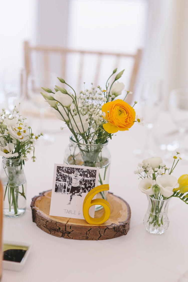 Jar Flowers Log Slice Gypsophila Ranunculus Pretty Spring Yellow Fun Personal Wedding Yeldersley Hall Derbyshire http://www.elliegracephotography.co.uk/