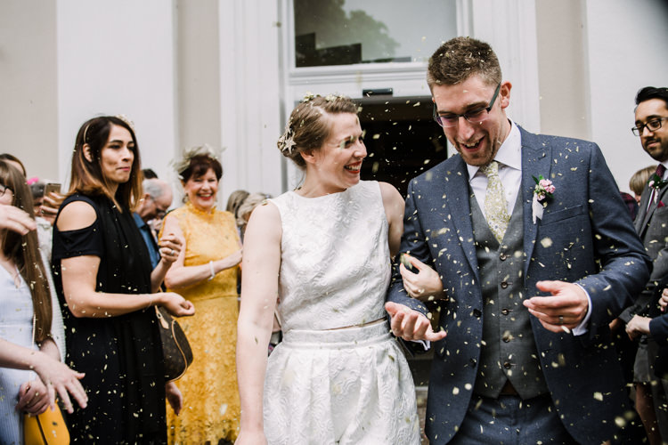 Bride Bridal Dress Gown Two Piece Crop Top Groom Grey Blue Green Three Piece Waistcoat Confetti Shot Fun DIY Wedding New Walk Museum Leicester https://www.daniellefrancescaphotography.com/