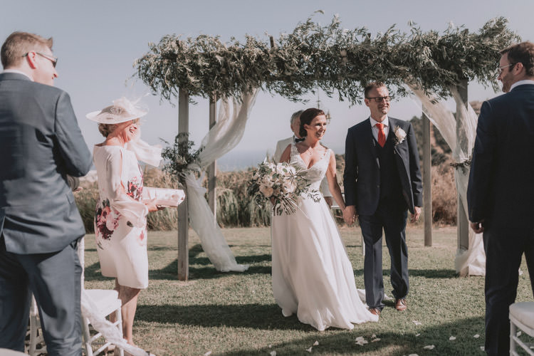 Outdoor Fields Garden Villa Italy Rustic Natural Vineyard Orchard Bride Groom Ceremony Aisle White Greenery Floral Arch | Sage Green Mediterranean Destination Wedding Spain https://www.kinoortega.com/