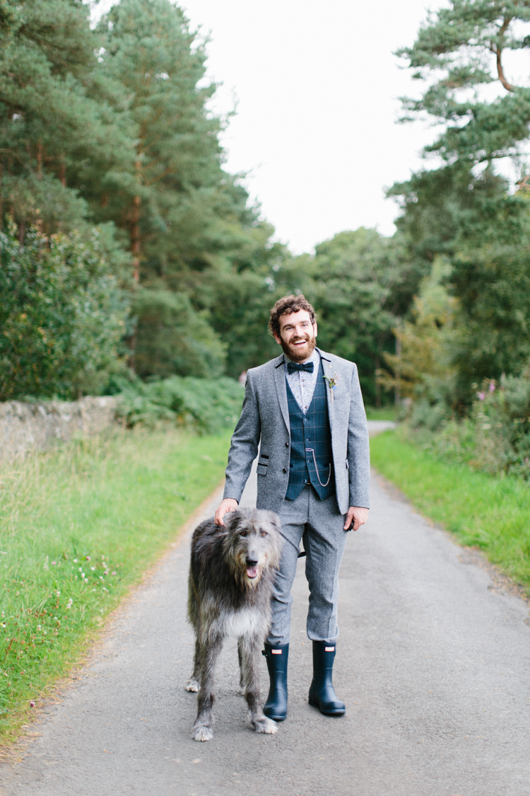 Groom Suit GRey Tweed Waistcoat Floral Shirt Bow Tie Hunter Wellies Dog Fun Joyful Pink Blue Summer Healey Barn Wedding Northumberland http://www.melissabeattie.com/