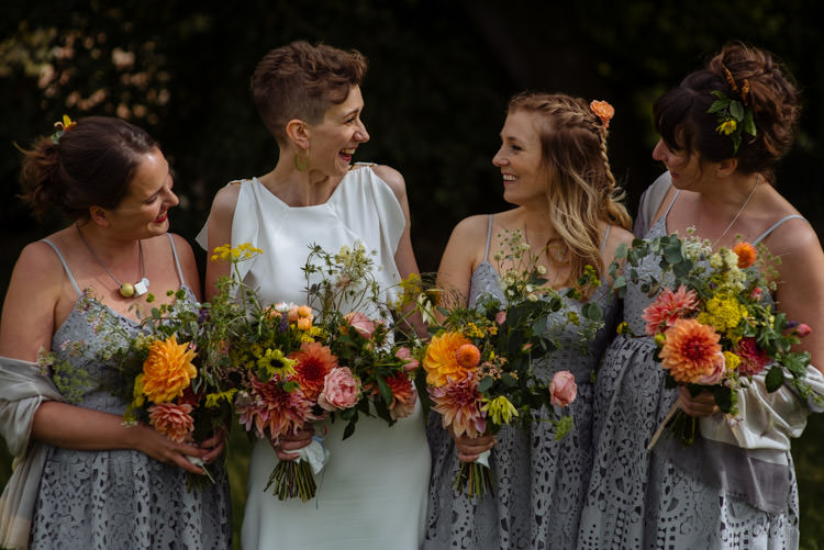 DIY Bride Bridesmaids Grey Dresses Seasonal Yellow Orange Wildflowers Alternative Hippy Garden Wedding | Homegrown Community Eclectic Rural Yorkshire Wedding https://toastofleeds.co.uk/