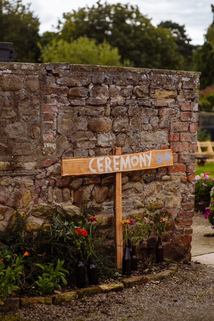 DIY Ceremony Sign Seasonal Alternative Hippy Farm Field Garden Wedding | Homegrown Community Eclectic Rural Yorkshire Wedding https://toastofleeds.co.uk/