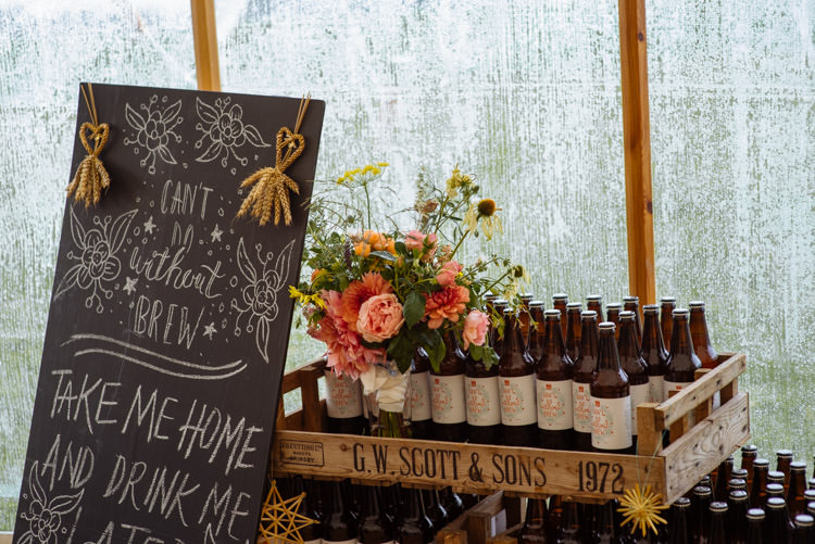 DIY Marquee Tipi Beer Bottle Wildflower Decor Alternative Hippy Forest Farm Field Garden Wedding | Homegrown Community Eclectic Rural Yorkshire Wedding https://toastofleeds.co.uk/