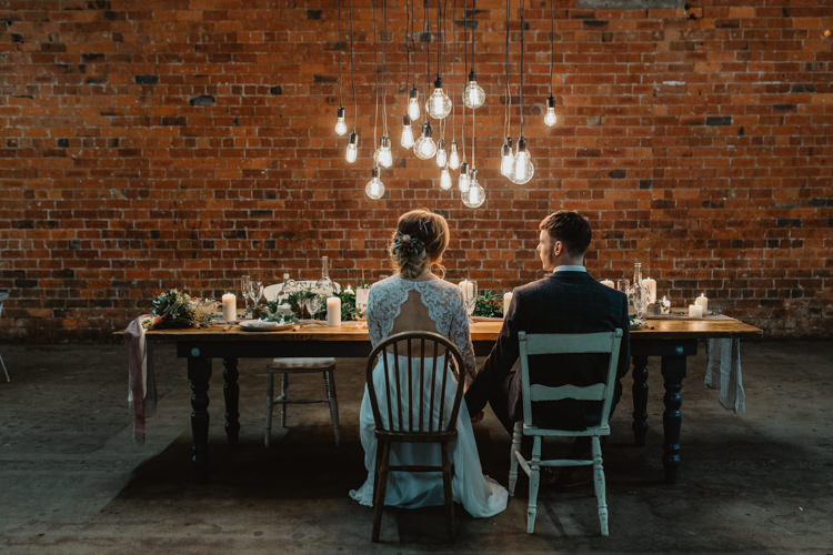 Tablescape Lighting Decor Table Greenery Industrial Violet Greenery Succulents Edison Lighting Wedding Ideas https://www.steviejayphotography.co.uk/