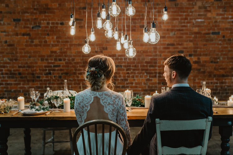 Tablescape Lighting Decor Table Greenery Industrial Violet Greenery Succulents Edison Lighting Wedding Ideas https://www.steviejayphotography.co.uk/