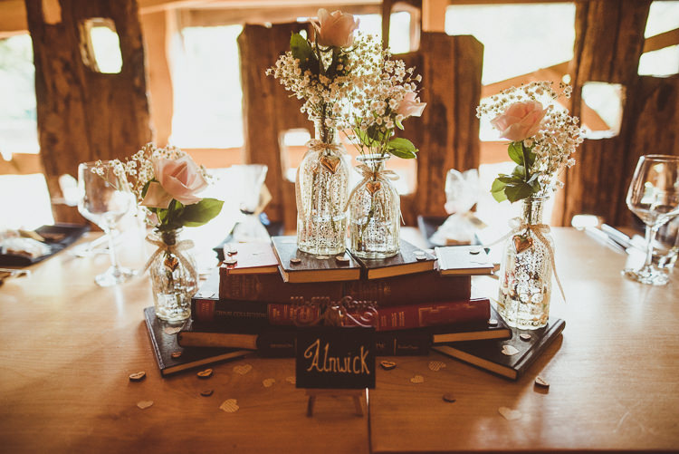 Decor Decoration Bottles Books Flowers Rose Pink Gypsophila Rustic Relaxed Woodsy Alnwick Treehouse Northumberland Wedding http://www.mattpenberthy.com/