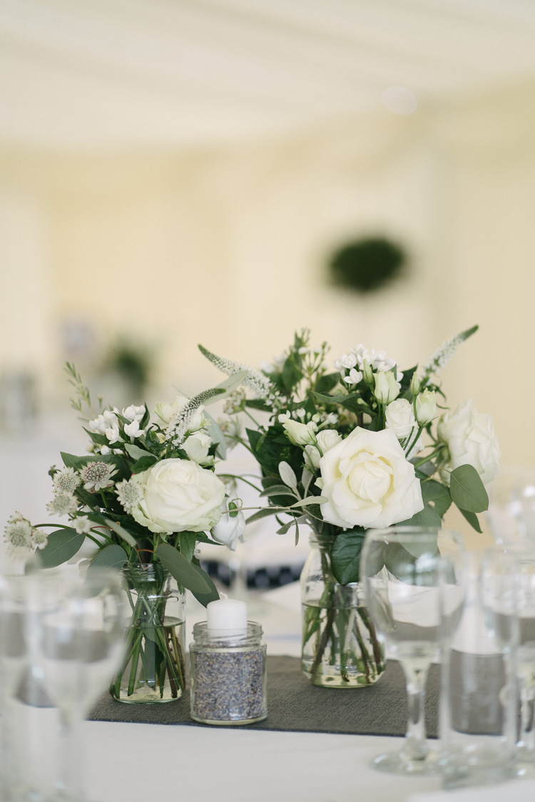 Table Centre Floral Flower Arrangement White Cream Rose Thistle Jam Jar Relaxed Bohemian Summer Meadow Wedding https://karibellamy.com/