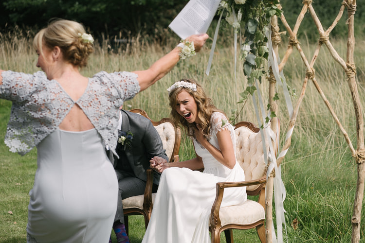 Ceremony Outdoor Seating Vintage Wooden Arch Arbour Relaxed Bohemian Summer Meadow Wedding https://karibellamy.com/
