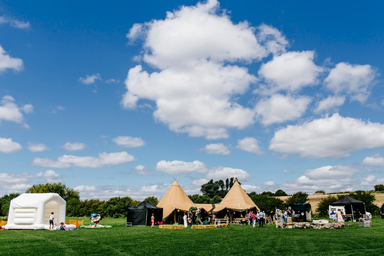Tipi Glamping Bouncy Castle Bright Fun Festival Boho Wedding The Party Field East Sussex http://epiclovestory.co.uk/