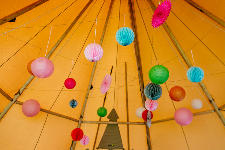 Honeycomb Lanterns Pinwheels Tipi Bright Fun Festival Boho Wedding The Party Field East Sussex http://epiclovestory.co.uk/