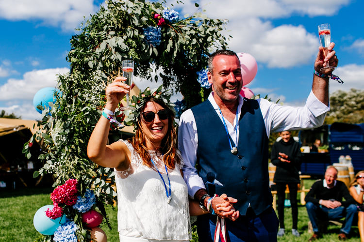 Flower Arch Backdrop Flowers Balloons Bright Fun Festival Boho Wedding The Party Field East Sussex http://epiclovestory.co.uk/