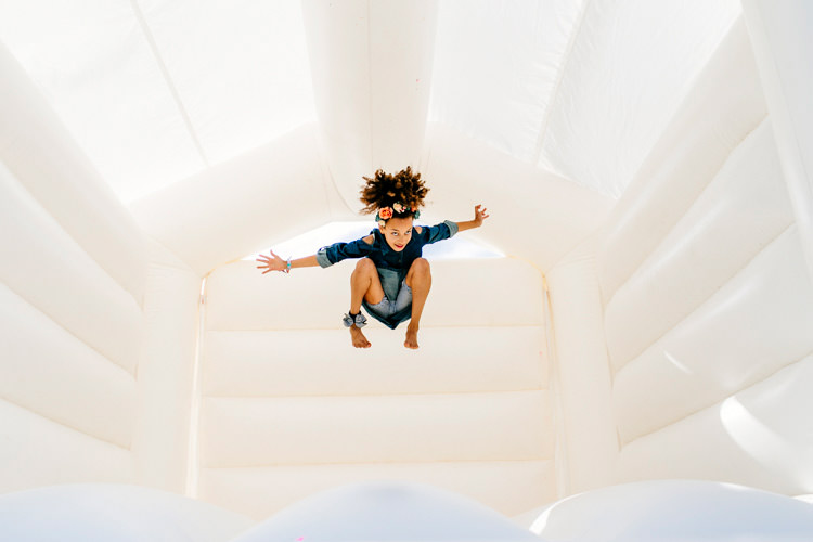 Bouncy Castle Bright Fun Festival Boho Wedding The Party Field East Sussex http://epiclovestory.co.uk/