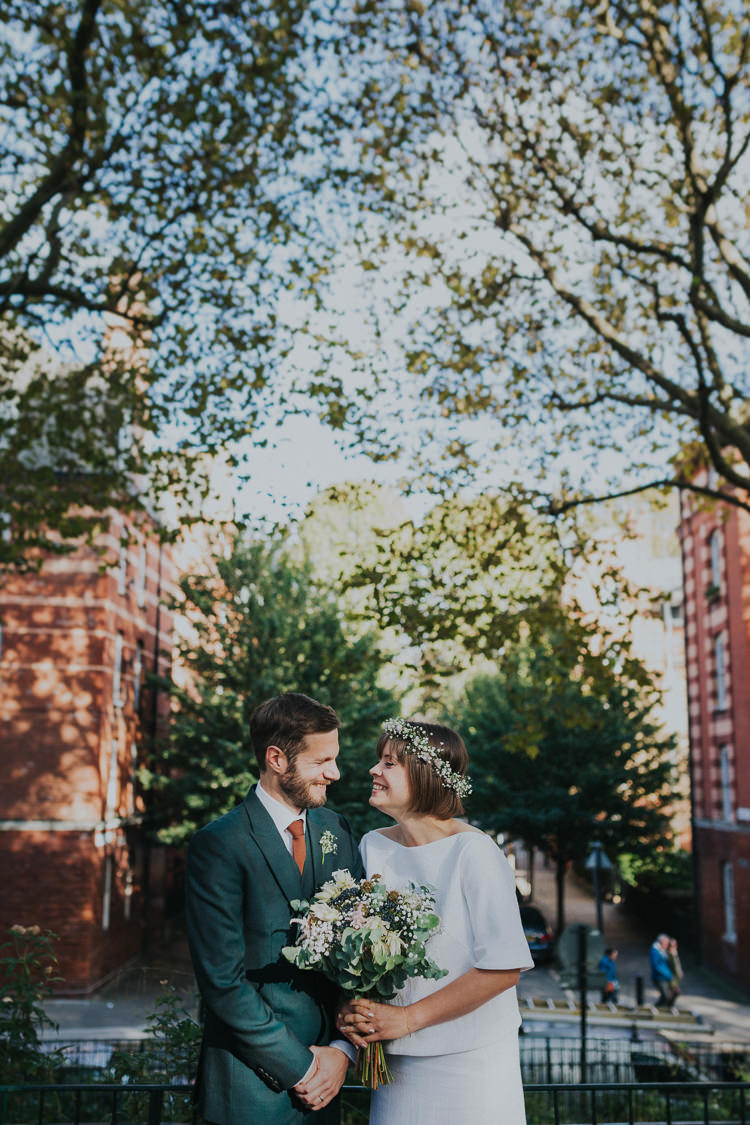 Bride Bridal Gypsophila Flower Crown Bouquet Greenery Two Piece Skirt Top Bespoke Groom Bottle Green Three Piece Waistcoat Orange Tie Chilled Out Individual Simple City Wedding Stoke Newington Town Hall London The Tab Centre http://www.kategrayphotography.com/