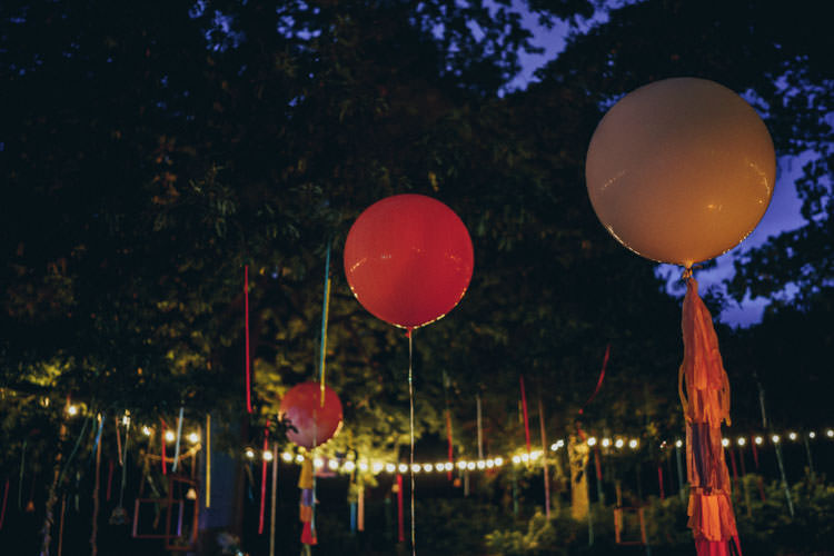 Giant Balloons Tassels Festoon Lights Colourful Outdoor Tipi Wedding Tekels Park Surrey https://grahamnixon.com/