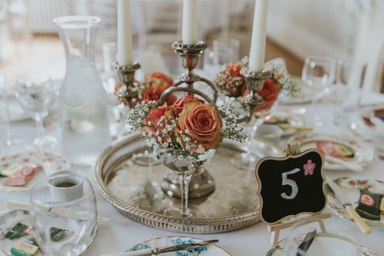 Centrepiece Silver Tray Roses Coral Candlesticks Table Numbers Alternative Vintage 1950s Knighton House Wedding Dorset http://www.paulunderhill.com/