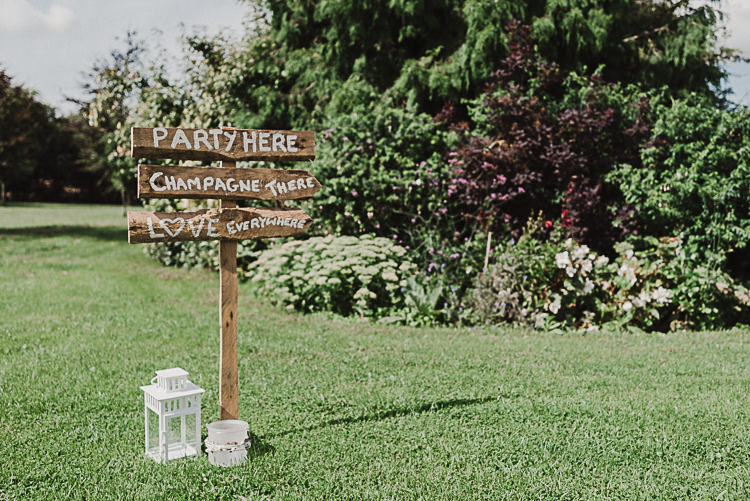 Rustic Wooden Signage Sign Post Lantern Magical Marquee Summer Alveston Pastures Farm Wedding https://willpatrickweddings.com/