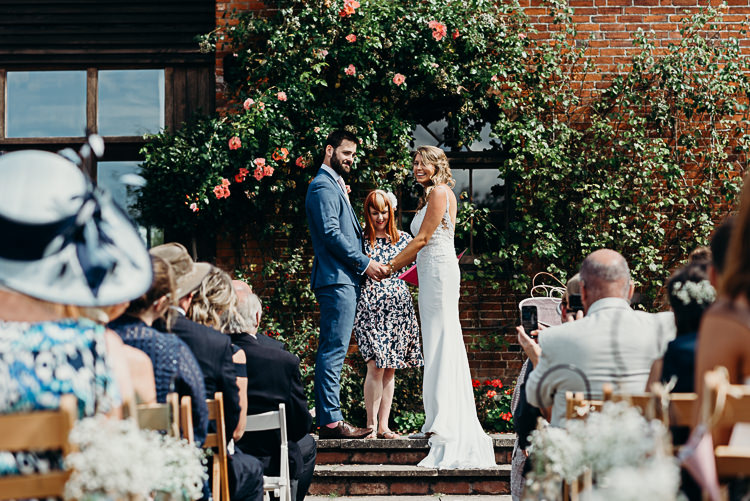 Bride Bridal Sleeveless Dress V Neck Blue Suit Groom Ceremony Outdoor Patio Magical Marquee Summer Alveston Pastures Farm Wedding https://willpatrickweddings.com/