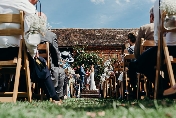 Bride Bridal Sleeveless Dress V Neck Blue Suit Groom Ceremony Aisle Magical Marquee Summer Alveston Pastures Farm Wedding https://willpatrickweddings.com/