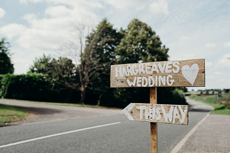 Rustic Wooden Signage Sign Post Magical Marquee Summer Alveston Pastures Farm Wedding https://willpatrickweddings.com/