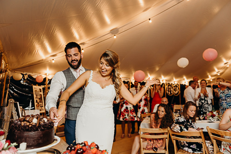 Bride Bridal Sleeveless Backless Dress V Neck Groom Pink Tie Grey Waistcoat Cutting the Cake Magical Marquee Summer Alveston Pastures Farm Wedding https://willpatrickweddings.com/