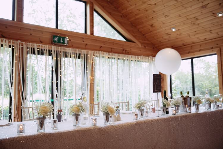 Top Table Ribbon Backdrop Sequin Cloth Balloons Flowers Greenery White Contemporary Wedding Styal Lodge Cheshire http://hayleybaxterphotography.com/