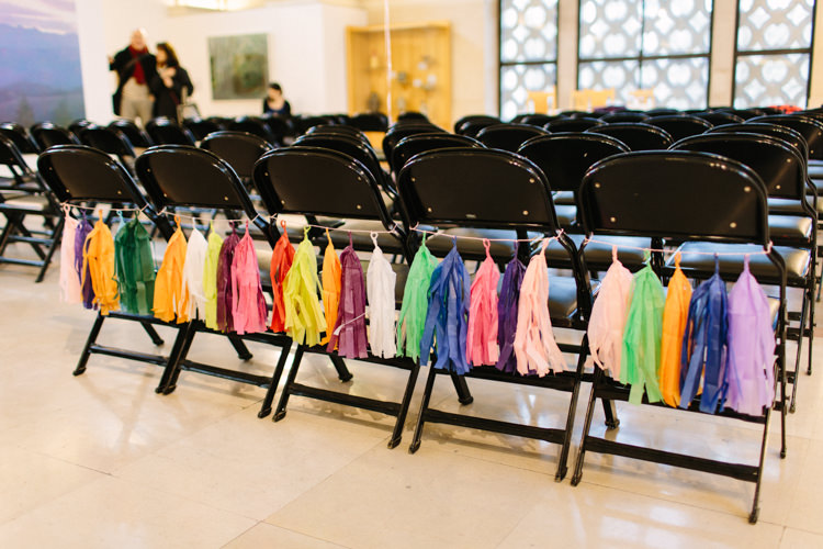 Tassel Garland Chair Decor Alternative Rainbow Fun Loving Budget Wedding Hanger Farm Arts Centre Southampton https://www.nicolastreaderphotography.co.uk/