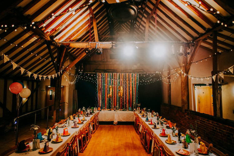 Barn Festoon Lights Bunting Backdrop Ribbon Alternative Rainbow Fun Loving Budget Wedding Hanger Farm Arts Centre Southampton https://www.nicolastreaderphotography.co.uk/