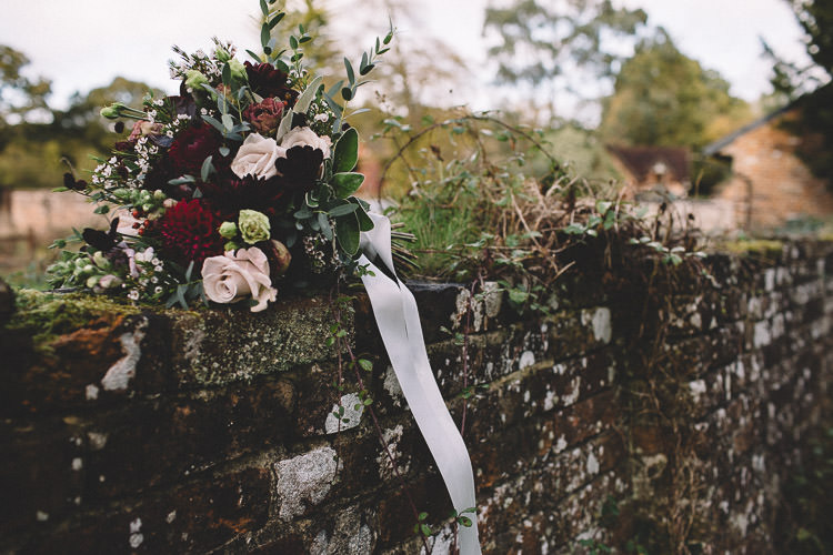 Bouquet Flowers Red Greenery Pink Ribbon Autumn Woodland Wedding Woodlands Lodge New Forest http://carrielaversphotography.co.uk/