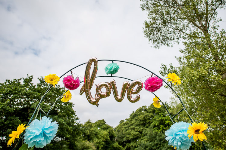 Arch Love Balloon Pom Pom Mismatched Colourful Wildflower Meadow Wedding Hush Venues Norfolk http://lighteningphotography.co.uk/