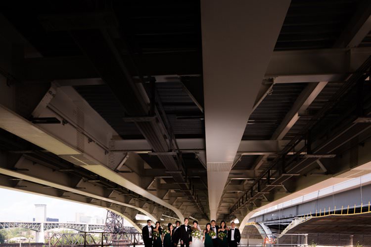 Bride Groom Bridesmaids Groomsmen Group Photo Bridge Hangar | Black Tie Carnival Wedding Hot Air Balloon http://www.makingthemoment.com/