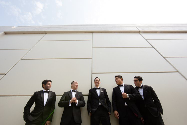 Groom Groomsmen Group Photo Bridge Hangar Building | Black Tie Carnival Wedding Hot Air Balloon http://www.makingthemoment.com/
