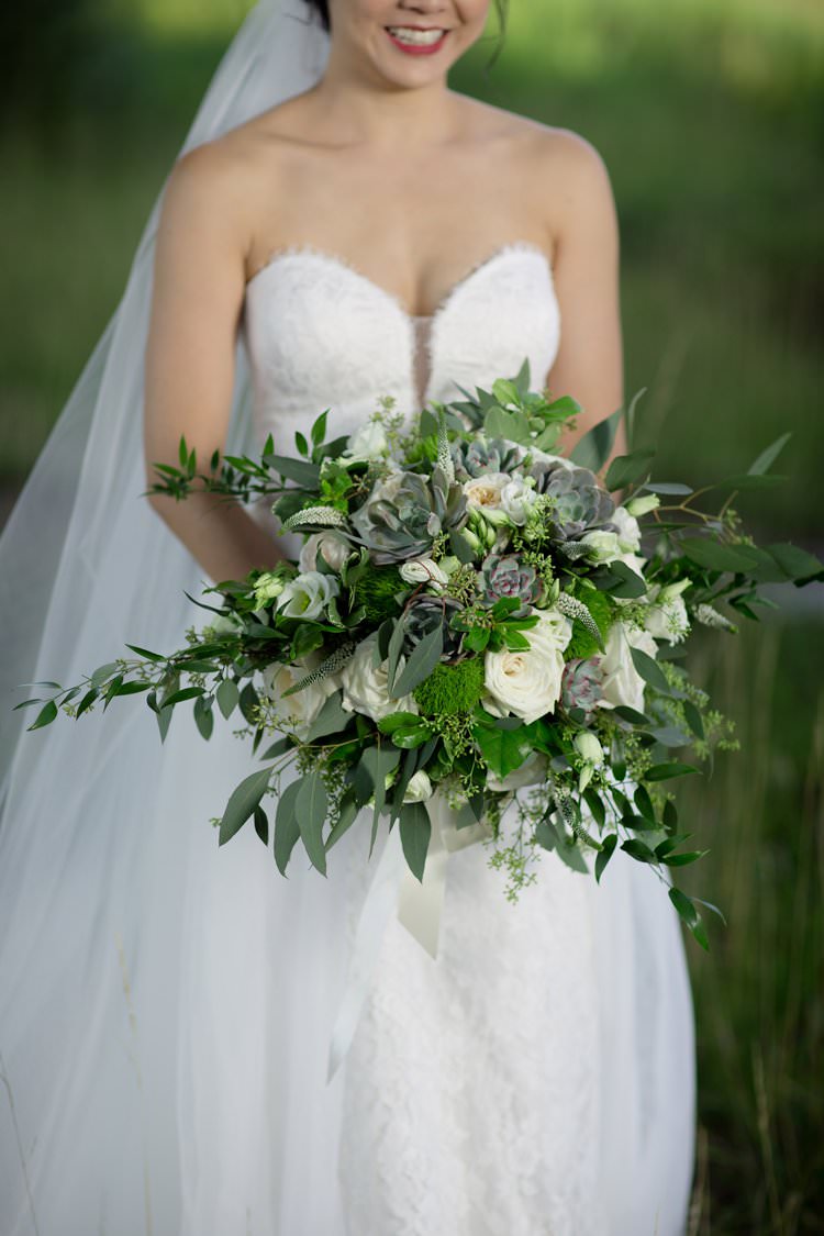 Outdoor Field Festival Rustic Hot Air Balloon Bride White Greenery Bouquet | Black Tie Carnival Wedding Hot Air Balloon http://www.makingthemoment.com/
