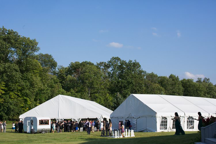 Outdoor Summer Field Rustic Marquee Tipi Tent Wood Greenery | Black Tie Carnival Wedding Hot Air Balloon http://www.makingthemoment.com/