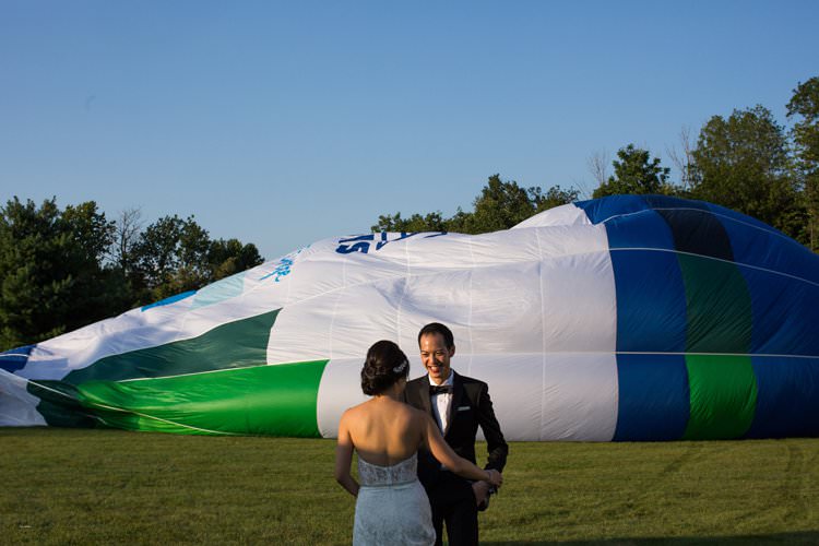 Outdoor Summer Field Rustic Marquee Tipi Tent Bride Groom | Black Tie Carnival Wedding Hot Air Balloon http://www.makingthemoment.com/