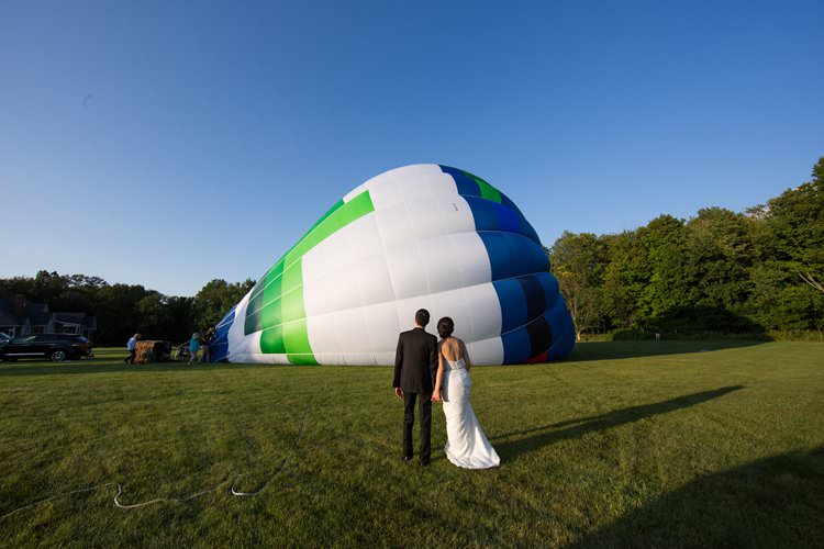 Outdoor Summer Field Rustic Marquee Tipi Tent Bride Groom | Black Tie Carnival Wedding Hot Air Balloon http://www.makingthemoment.com/
