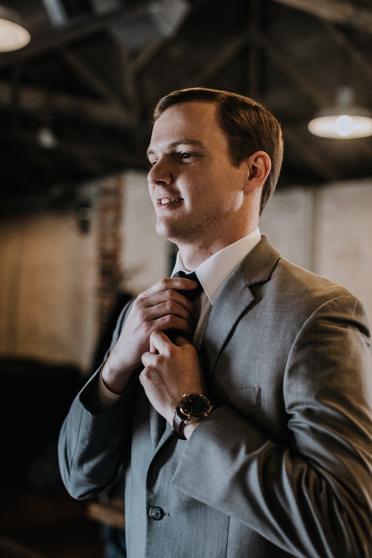 City Urban Georgia Engine Room Exposed Bricks Groom Grey Suit | Bohemian Industrial Oxblood Wedding https://www.lunaleephotos.com/
