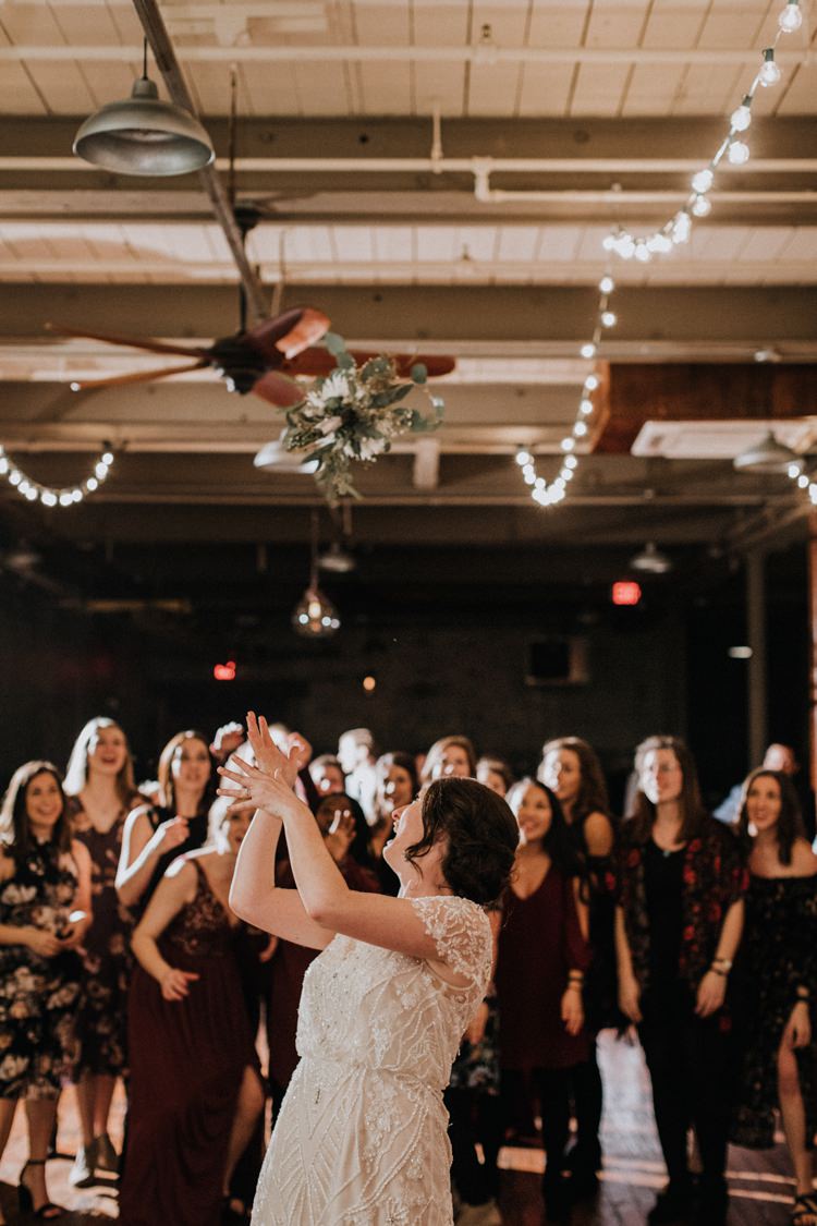 City Urban Georgia Engine Room Exposed Bricks Reception Dinner Chiavari Chairs Rustic Bouquet Toss | Bohemian Industrial Oxblood Wedding https://www.lunaleephotos.com/