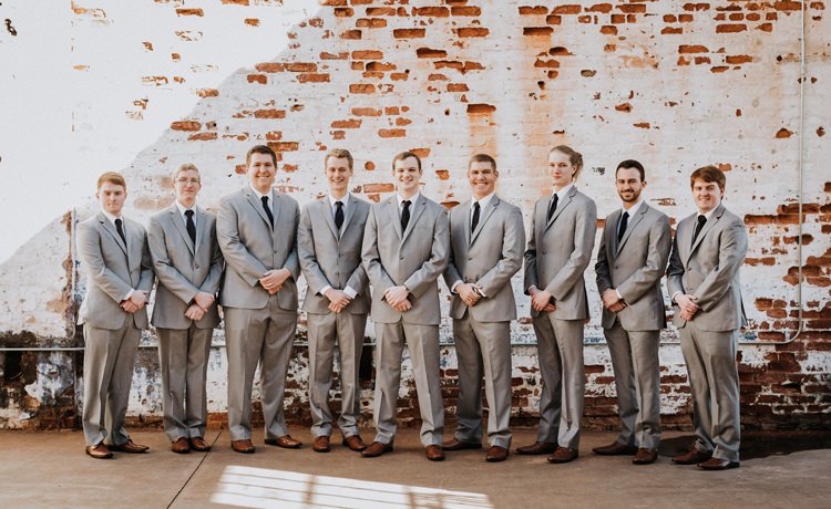 City Urban Georgia Engine Room Exposed Bricks Groom Groomsmen Grey Suits | Bohemian Industrial Oxblood Wedding https://www.lunaleephotos.com/