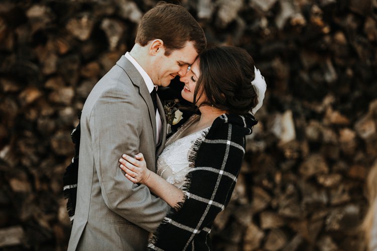 City Urban Georgia Engine Room Exposed Bricks Bride Groom Embrace First Look Blanket | Bohemian Industrial Oxblood Wedding https://www.lunaleephotos.com/