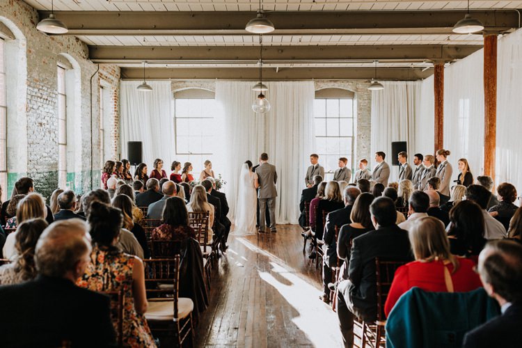 City Urban Georgia Engine Room Exposed Bricks Ceremony Aisle Bride Groom | Bohemian Industrial Oxblood Wedding https://www.lunaleephotos.com/
