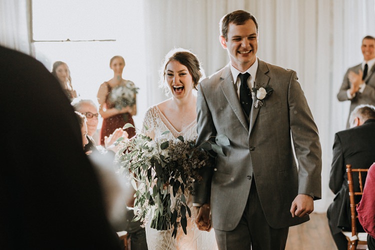 City Urban Georgia Engine Room Exposed Bricks Ceremony Aisle Bride Groom Greenery White Bouquet | Bohemian Industrial Oxblood Wedding https://www.lunaleephotos.com/