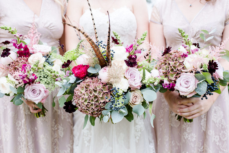 Bride Bridal Bridesmaids Bouquets Pheasant Feather Multicoloured Pink Rose Autumn Countryside Family Farm Wedding Dorset http://www.lydiastampsphotography.com/