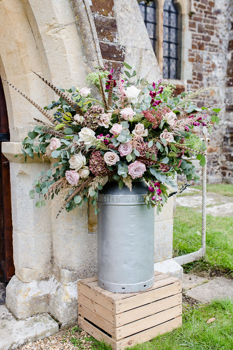 Church Entrance Milk Churn Florals Flowers Pallet Pheasant Flowers Rose Autumn Countryside Family Farm Wedding Dorset http://www.lydiastampsphotography.com/
