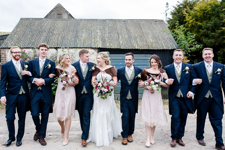 Bride Bridal Lace Strapless Dress Tulle Veil Bouquet Multicoloured Pheasant Feather Groom Blue Tails Waistcoat Three Piece Suit Bridesmaids Pink Blush Brown Fur Cape Groomsmen Autumn Countryside Family Farm Wedding Dorset http://www.lydiastampsphotography.com/