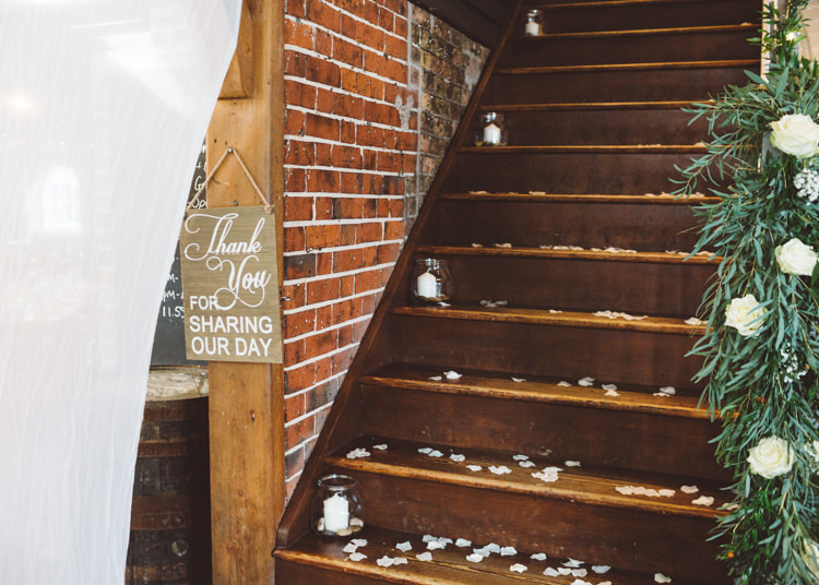 Stairway Confetti Candles in Jars Greenery Foliage White Cream Roses Cool Stylish Windy Coastal Wedding East Quay Lobster Shack Whitstable http://holliecarlinphotography.com/