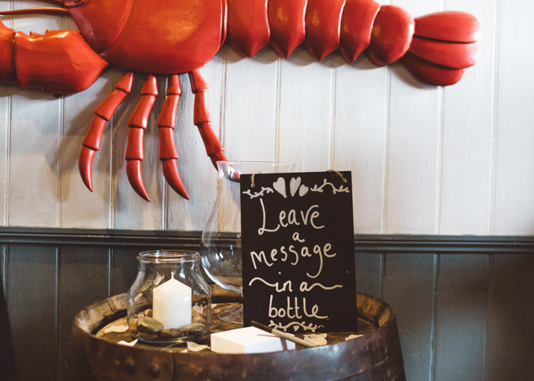 Guest Book Message in a Bottle Barrel Candle in Jar Cool Stylish Windy Coastal Wedding East Quay Lobster Shack Whitstable http://holliecarlinphotography.com/
