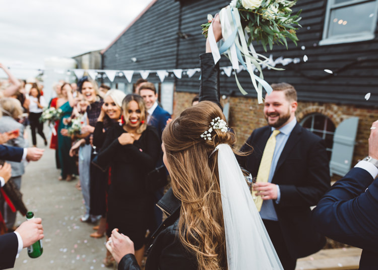 Bride Bridal Leather Jacket Veil Gypsophila Hair Cool Stylish Windy Coastal Wedding East Quay Lobster Shack Whitstable http://holliecarlinphotography.com/