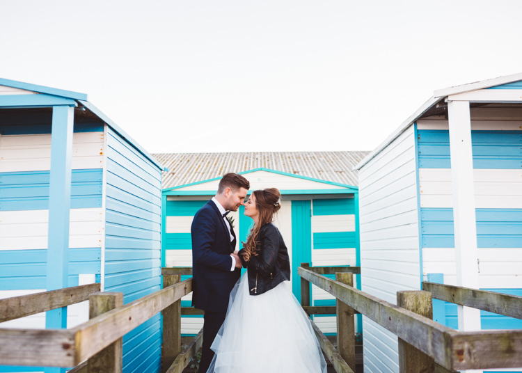 Bride Bridal Hayley Paige Dress Gown Tulle Princess Tuxedo Groom Waistcoat Navy Bow Tie Leather Jacket Beach Huts Cool Stylish Windy Coastal Wedding East Quay Lobster Shack Whitstable http://holliecarlinphotography.com/