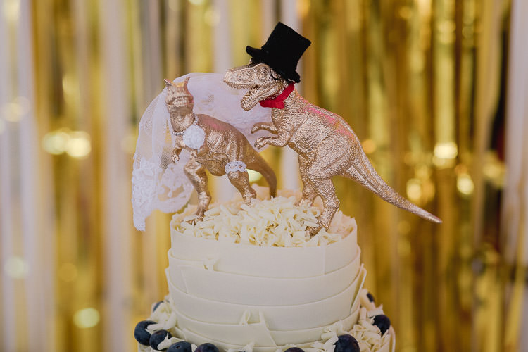 Gold Dinosaur Cake Topper Colourful Indie London City Wedding Clissold House West Reservoir Centre https://www.murrayclarke.co.uk/